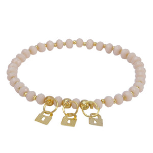Pulsera Marfil-Oro Con Dijes De Candado