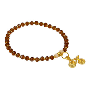 Pulsera Topacio Con Cuentas De Metal Oro Y Dije Bicicleta